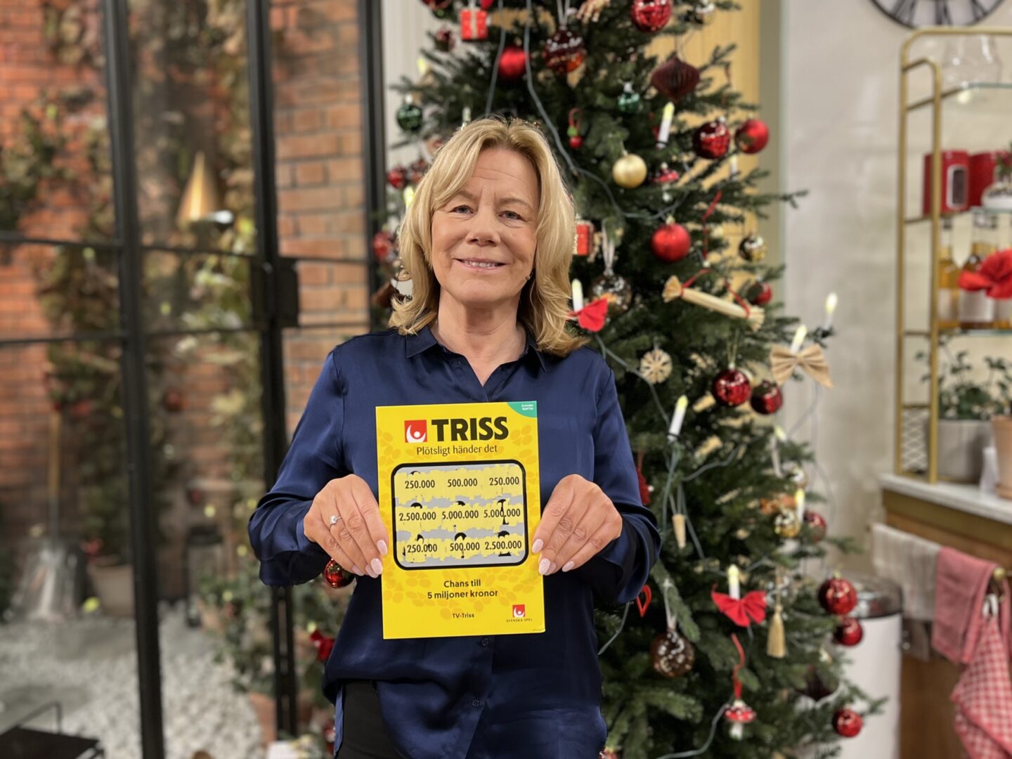 Åsa från Johanneshov skrapade fram en kvarts miljon kronor på Triss i tv under julaftons morgon